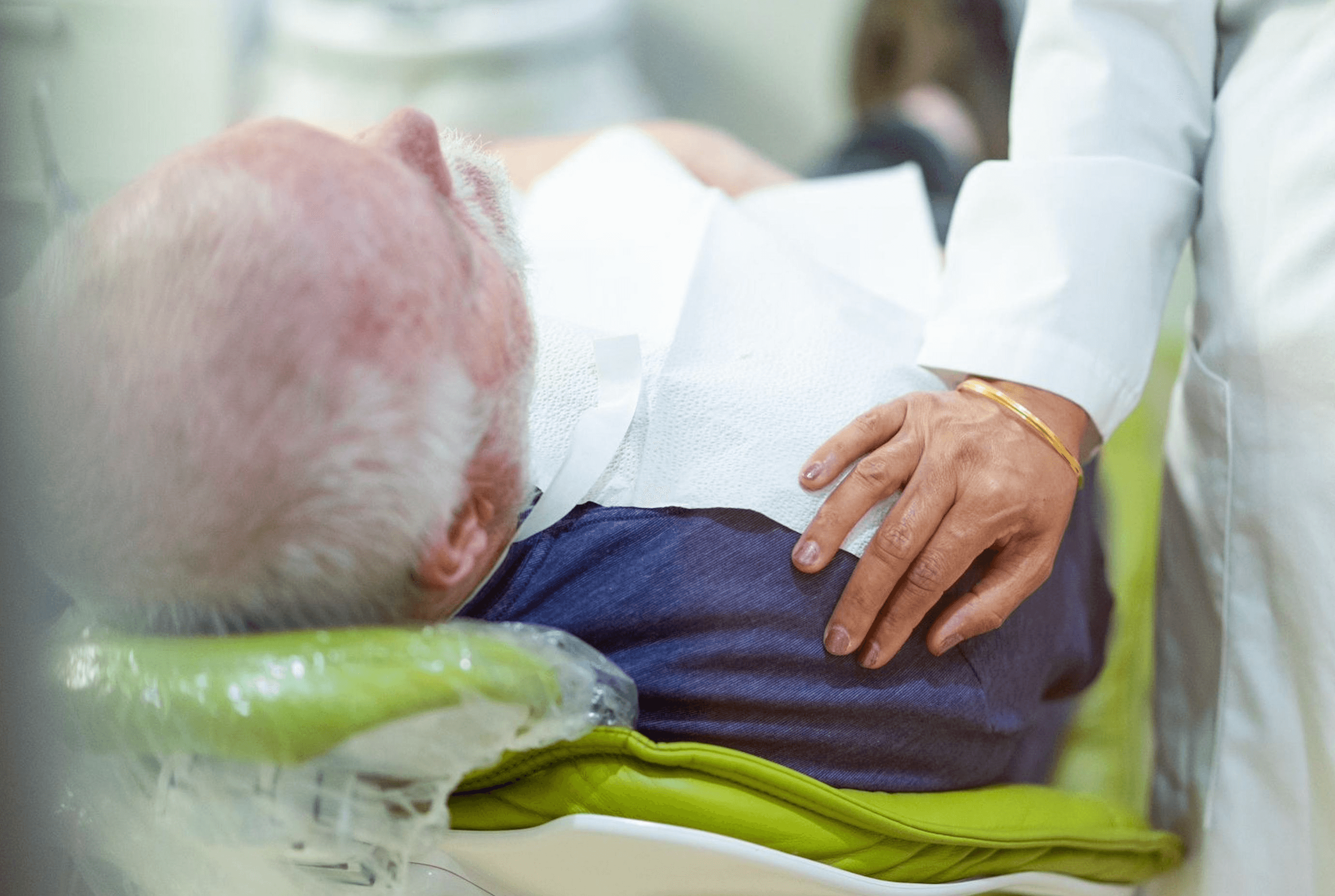 Patient relaxing comfortably during root canal treatment at Esthetique Dentistry Ashburn